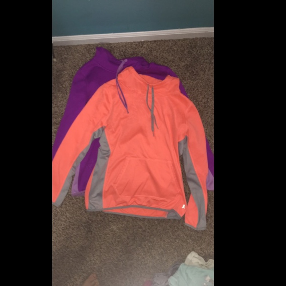 Orange and purple sweatshirts
